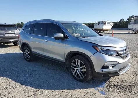 2017 Honda Pilot Touring z USA, uszkodzony, nr VIN 5FNYF5H98HB027672